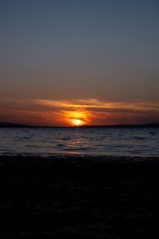 A tranquil sunset view over the waters of Sakarya Lake, capturing serene and warm hues.