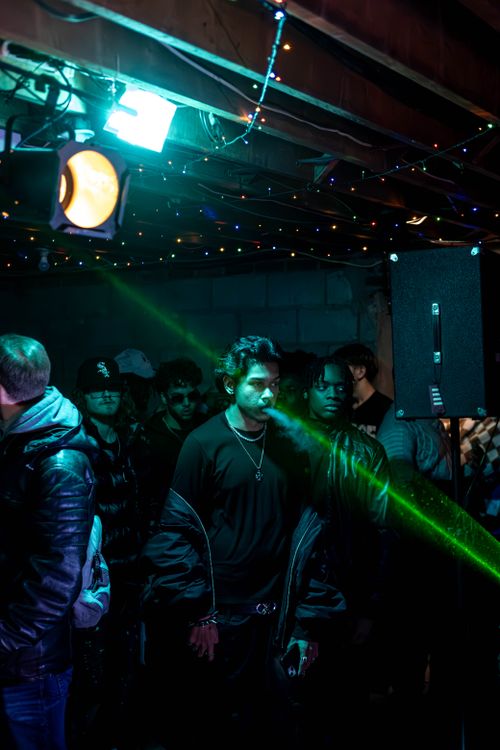 Free Dynamic concert atmosphere with vibrant lights in Toronto's underground music scene. Stock Photo