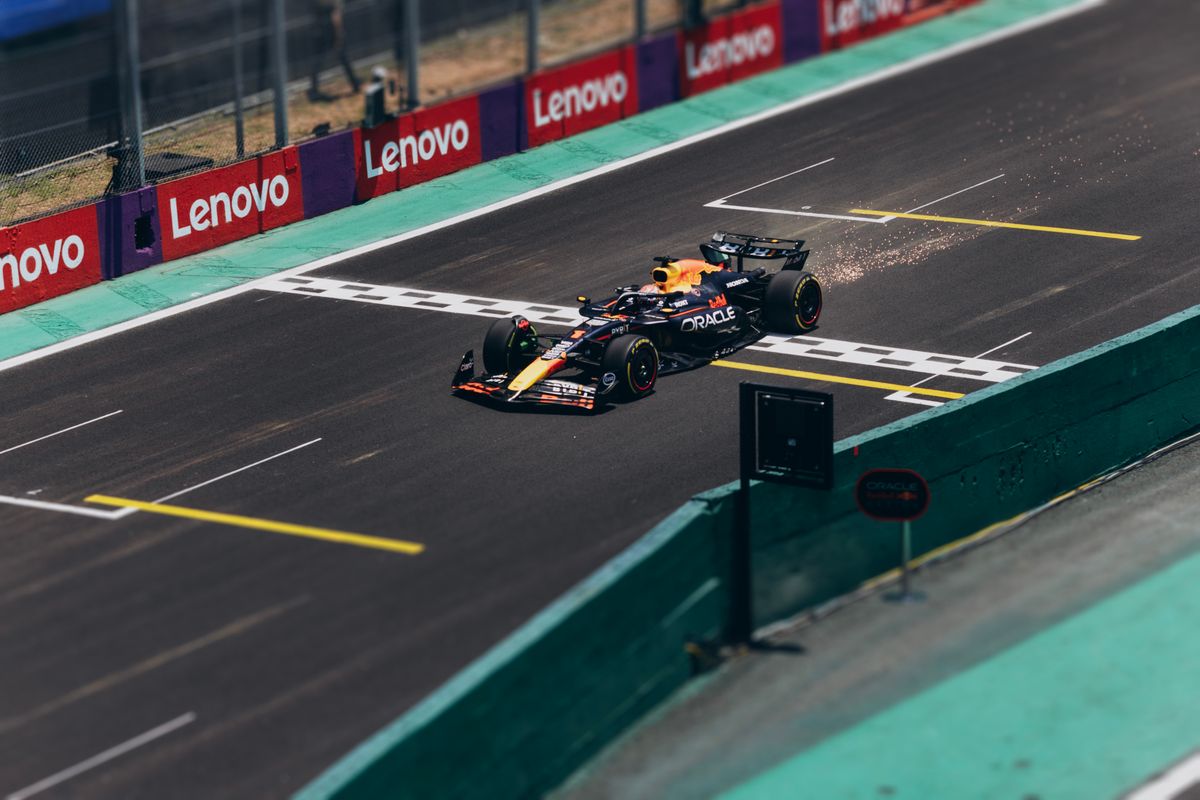 High-Speed Formula 1 Race Car on Track · Free Stock Photo