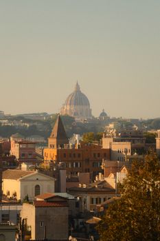 A scenic view of St. Peter's Basilica and Rome's historic skyline during the day.