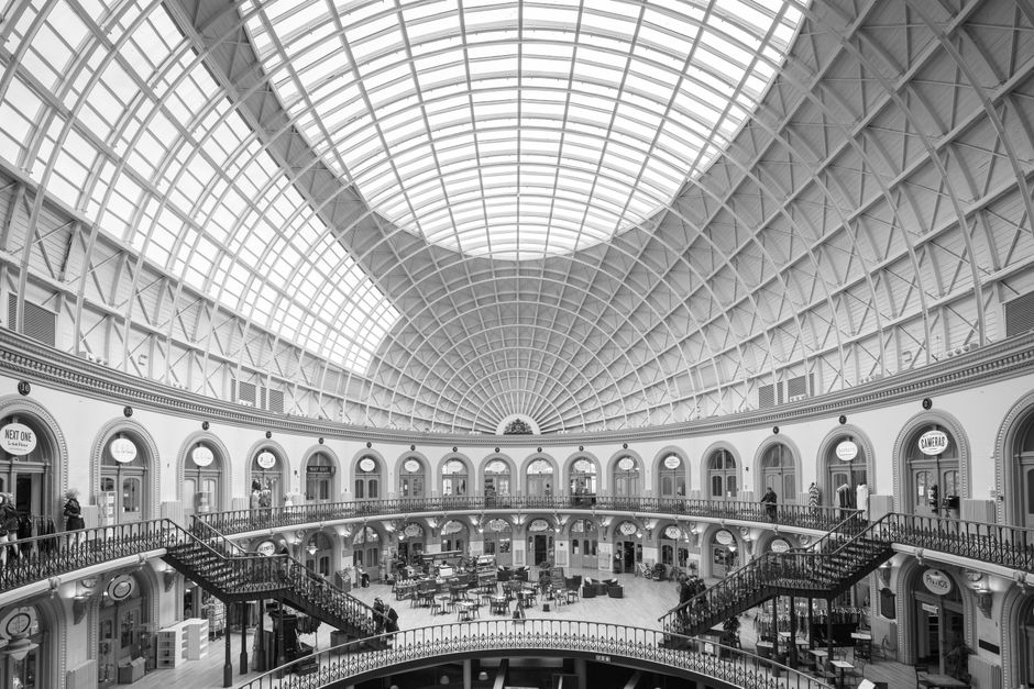 Majestic domed interior with classic architecture and expansive glass ceiling.