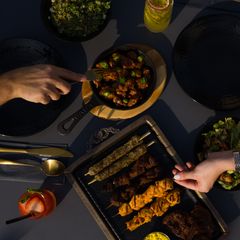 Set dinner table at dusk, photo by Ali Dashti on Pexels