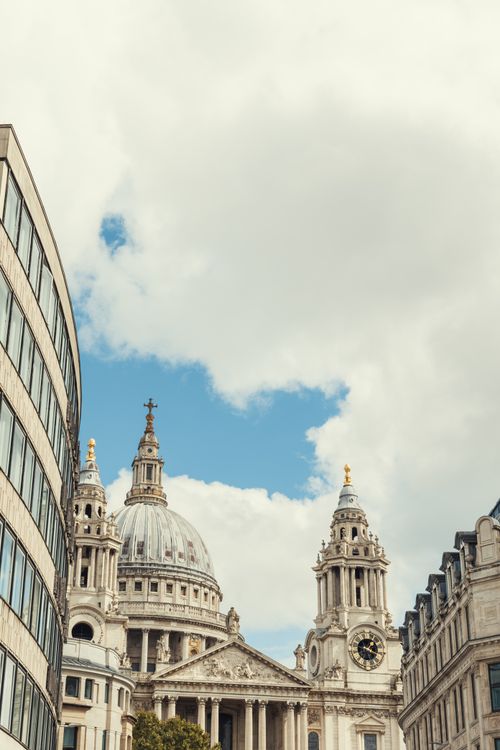 Free A striking view of St. Paul's Cathedral under a bright sky in London, England. Stock Photo