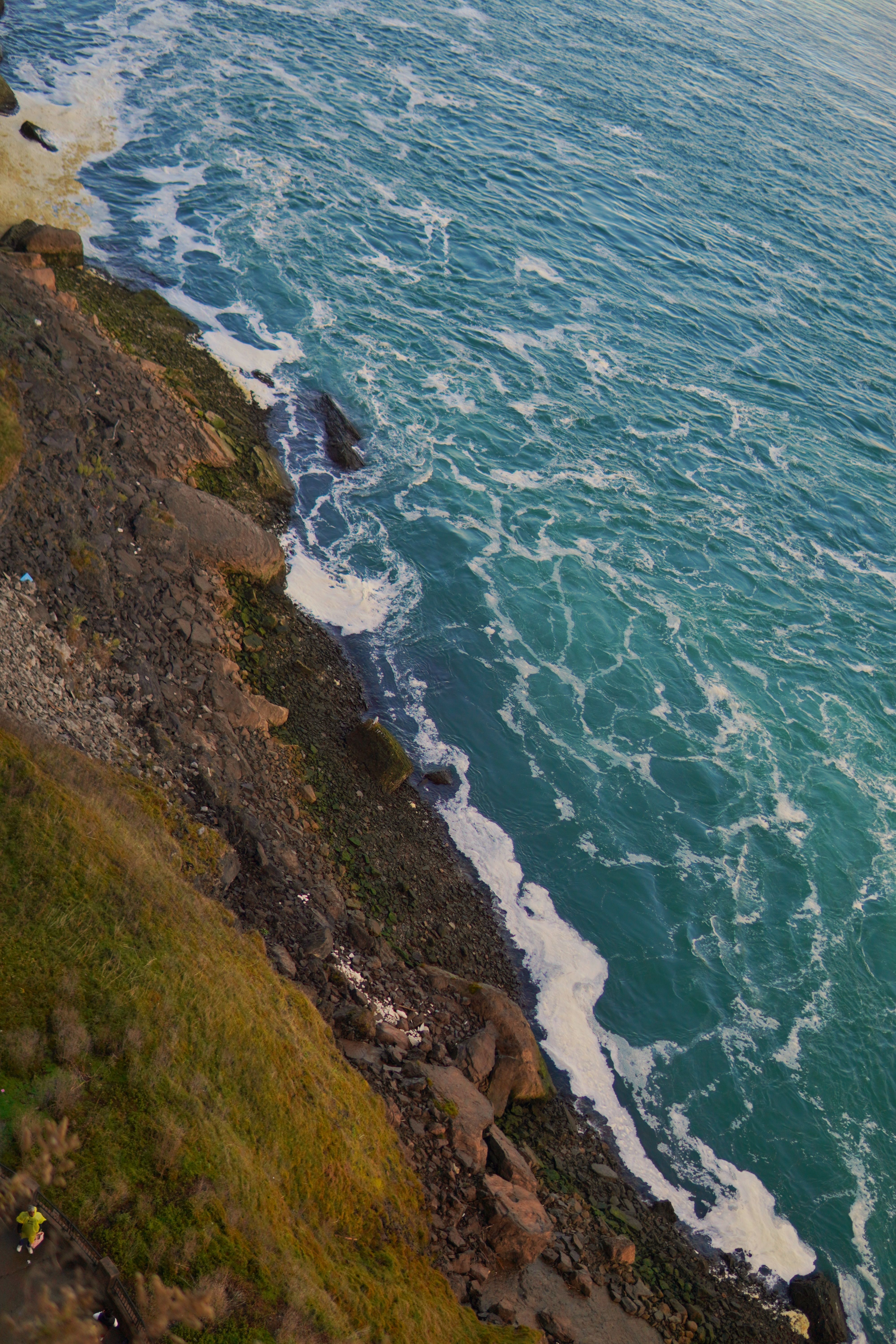 Aerial View of Rocky Coastline and Ocean Waves · Free Stock Photo