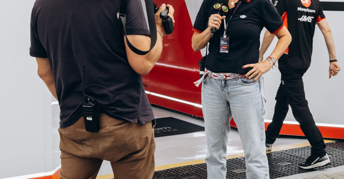 Raceway Interview TV Crew Filming Interview at Raceway · Free Stock Photo