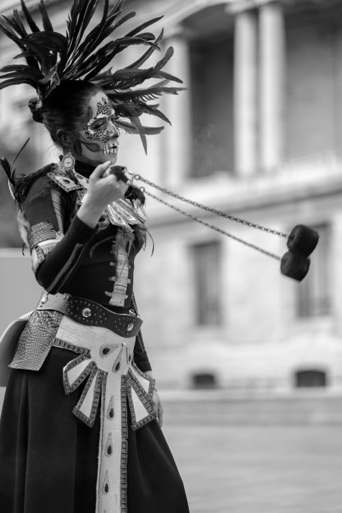 Free A person in elaborate Catrina costume and makeup, showcasing Mexican culture in black and white. Stock Photo
