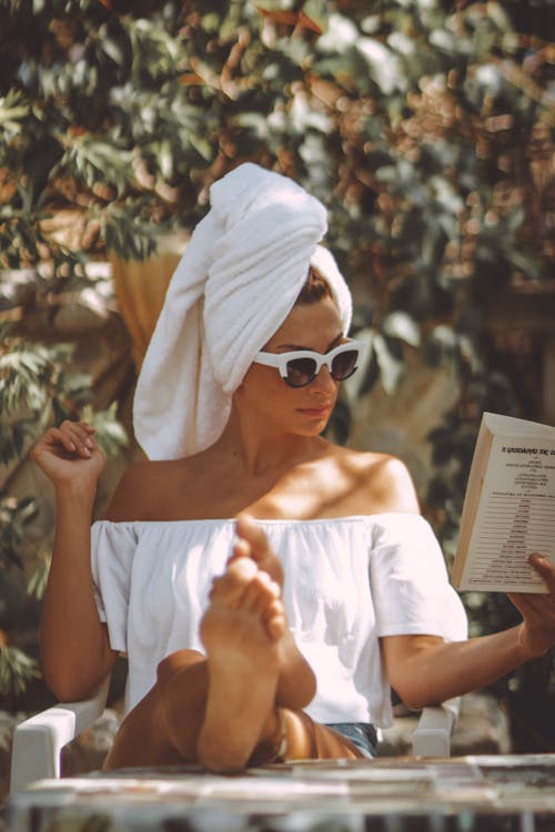 Photo Of Woman Holding Book