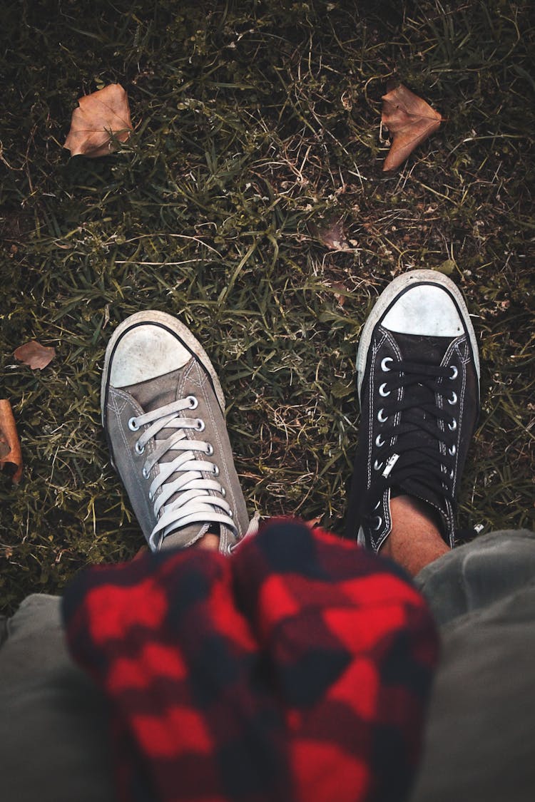 Person Wearing Two Different Shoes