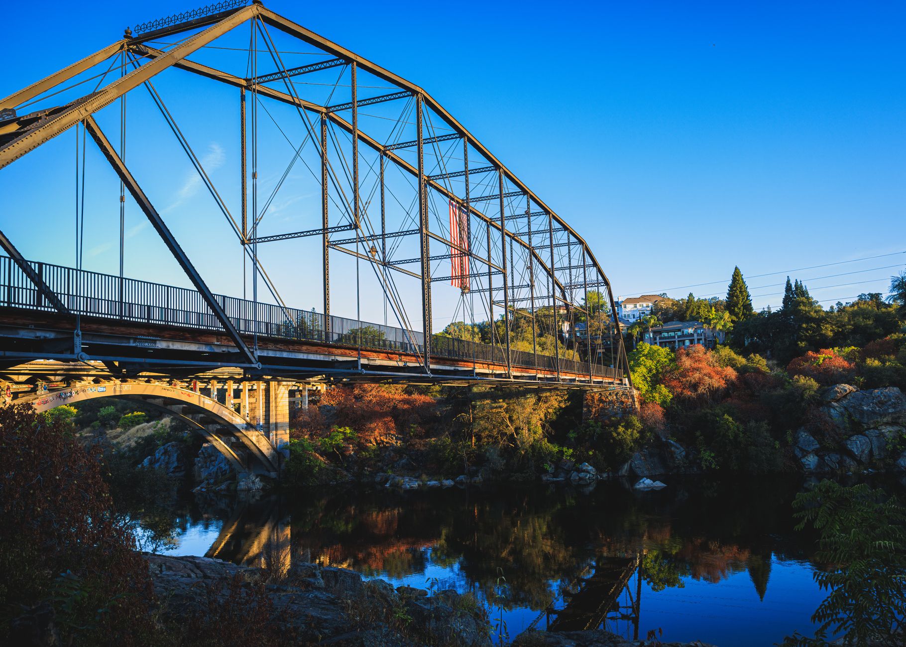 Stunning view of the iconic Rainbow Bridge in Folsom, California during daylight.
