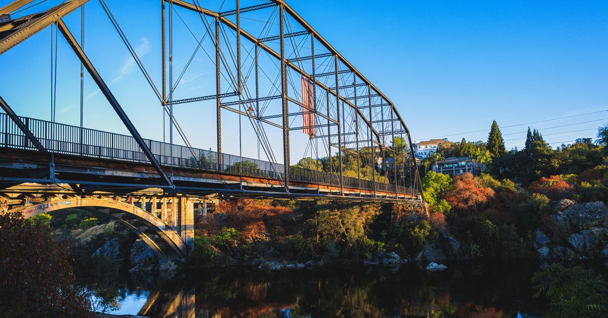 Stunning view of the iconic Rainbow Bridge in Folsom, California during daylight.