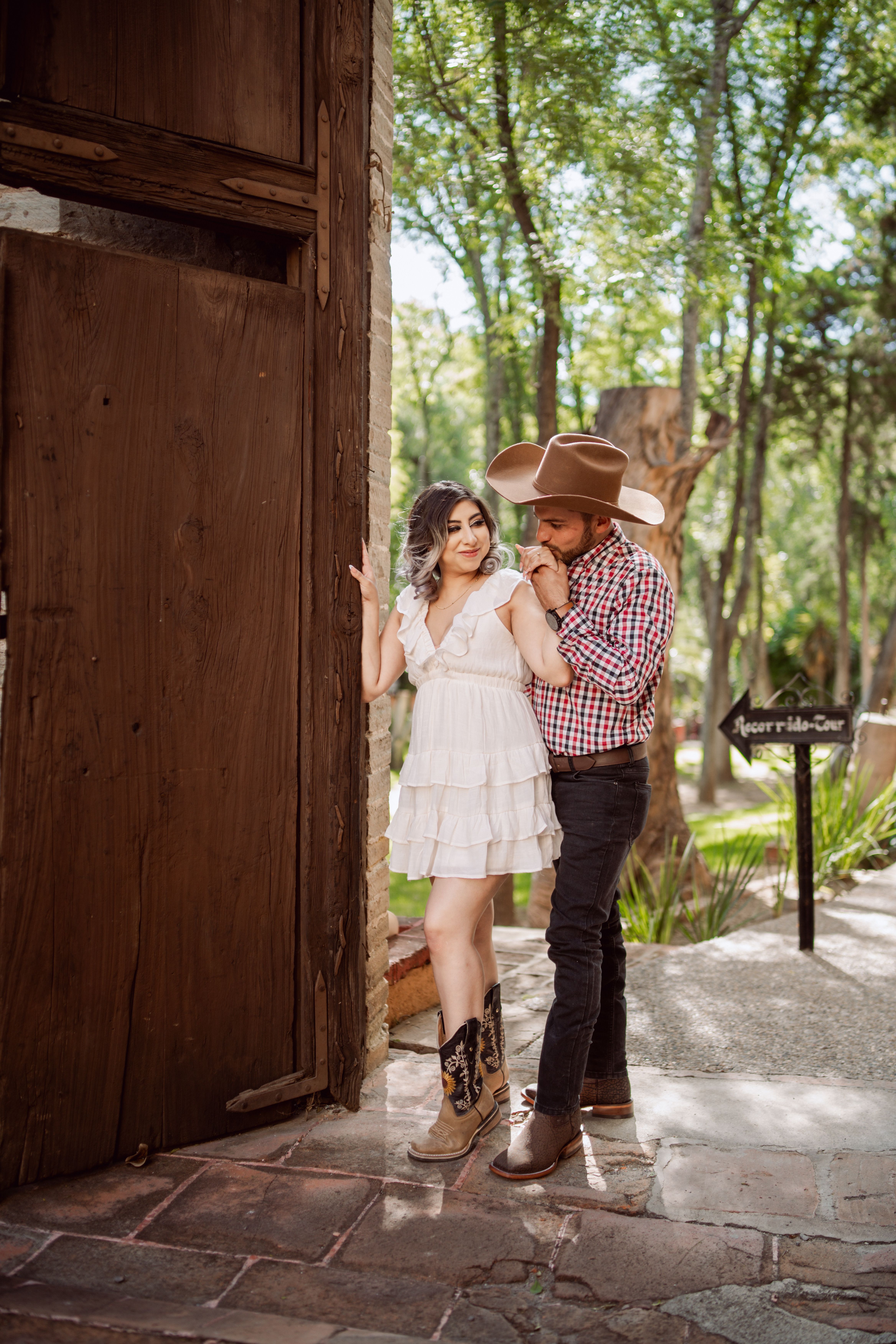 Young Couple in Stylish Western Outfits Outdoors · Free Stock Photo