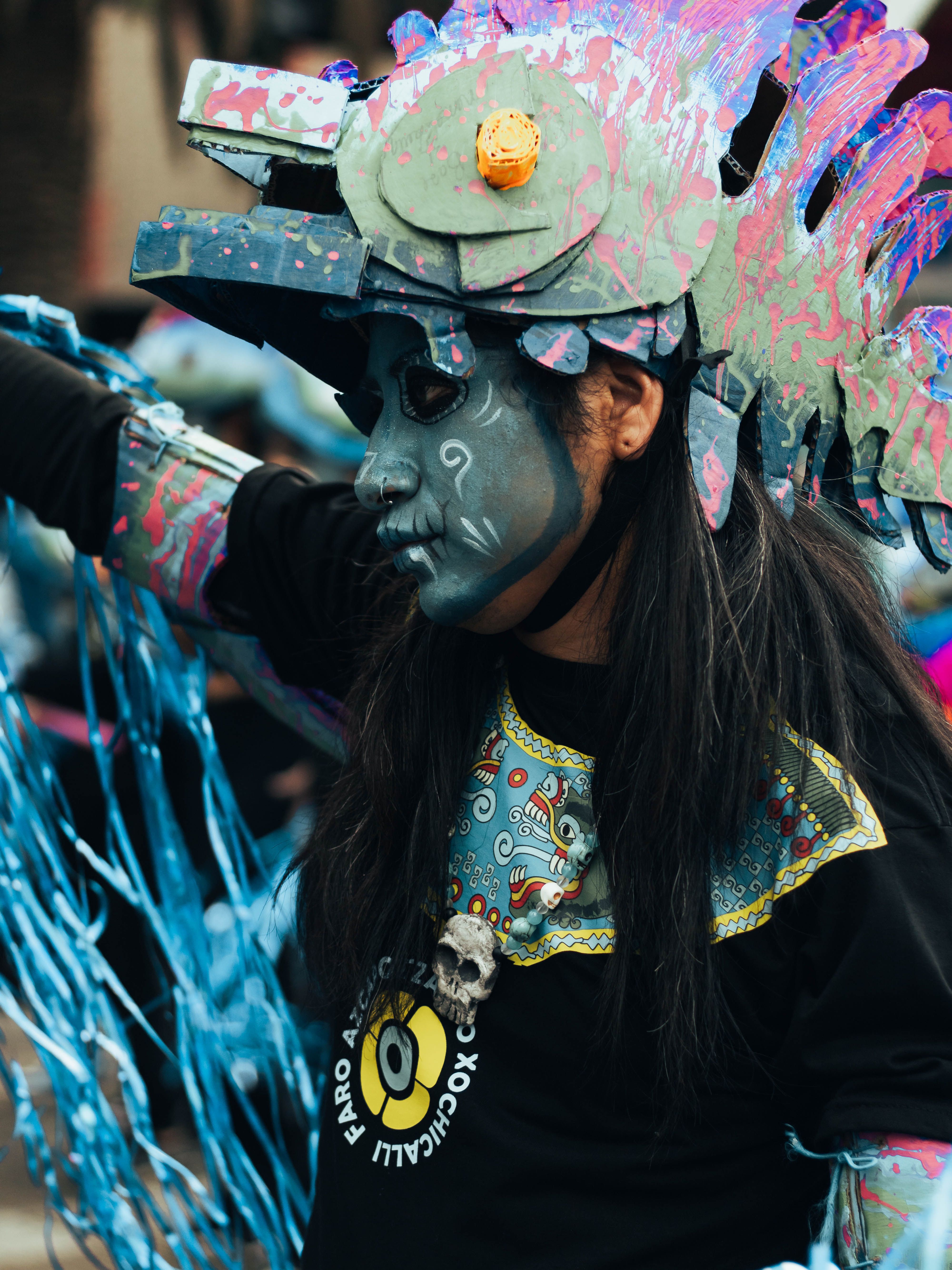 Colorful Day of the Dead costume in Mexico City's celebration, showcasing Mexican culture.