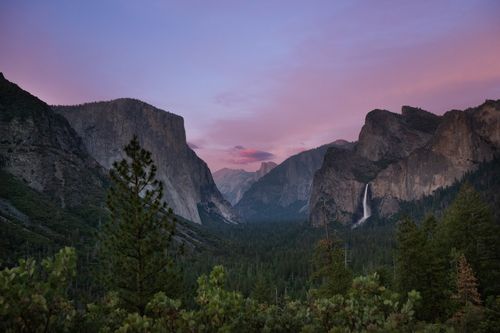 Free Stunning sunset over Yosemite Valley with El Capitan and Bridalveil Fall. Stock Photo