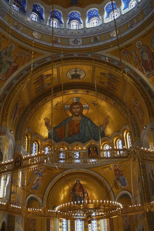 Free Explore the ornate gold interior of an Orthodox church with stunning religious icons and architecture. Stock Photo