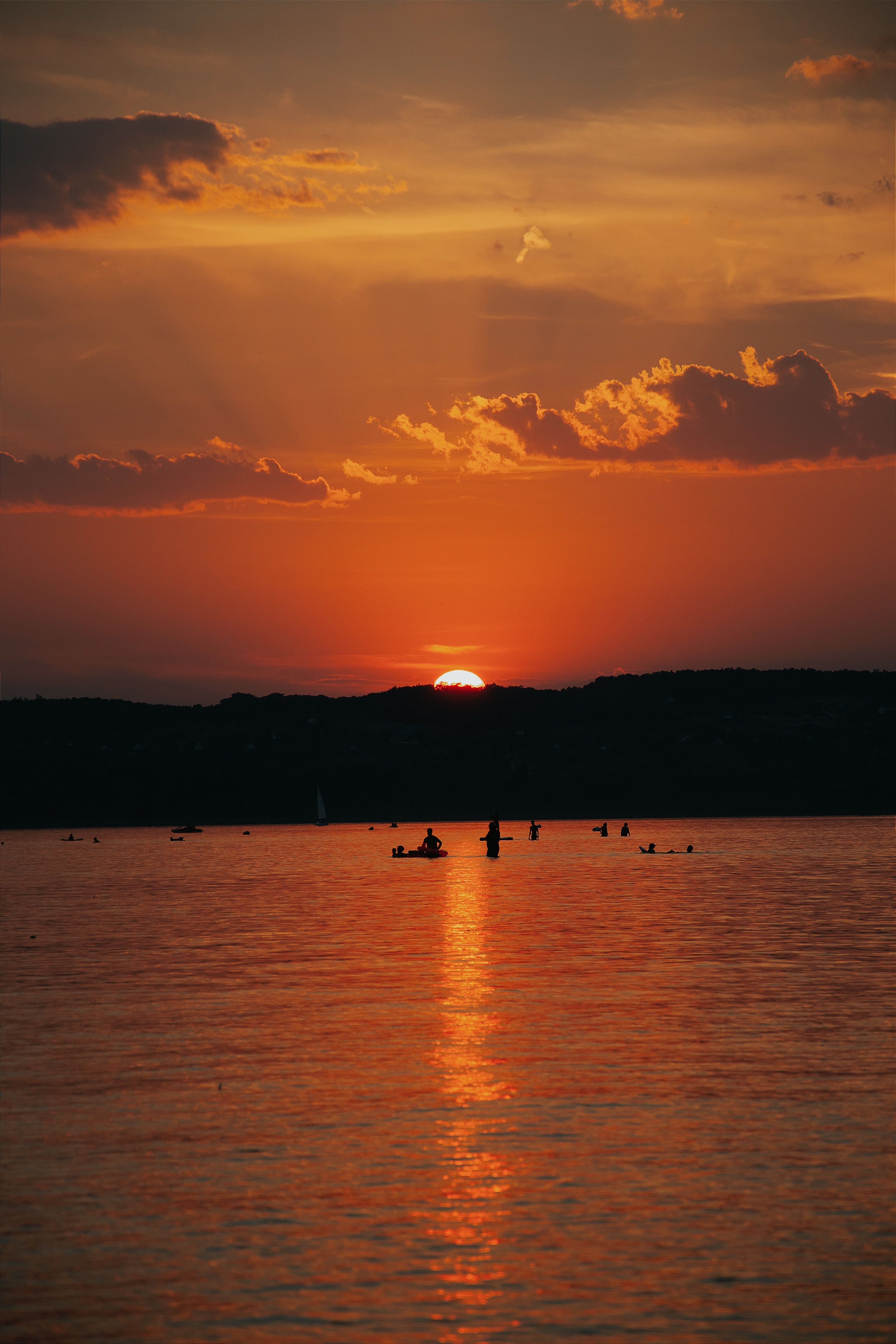 Sun setting over open water, photo by Molnar Tamas Photography on Pexels