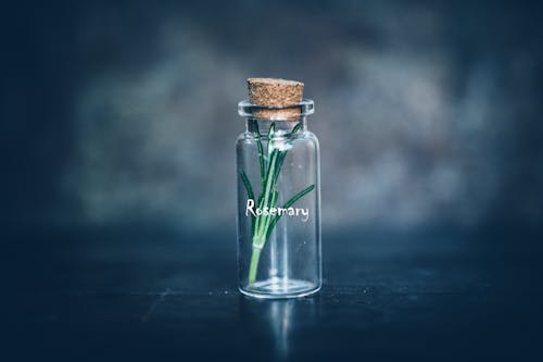 Empty Clear Glass Bottle