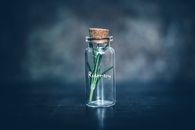 Empty Clear Glass Bottle