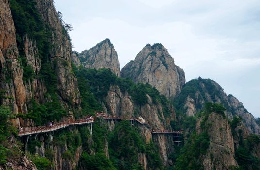 Panoramic view of a mountain pathway in Luoyang, China, showcasing natural beauty and adventure.