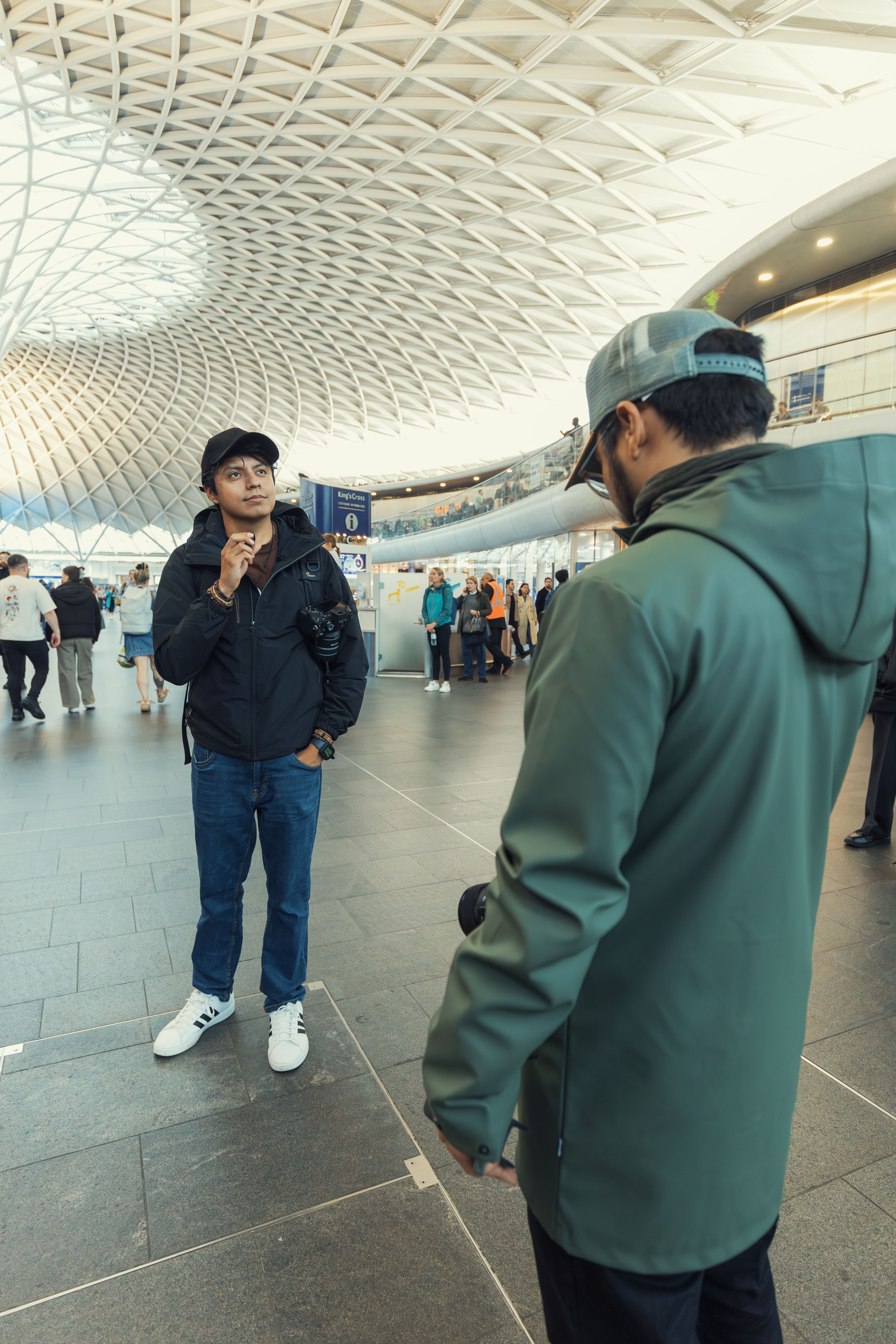 Captivating Urban Architecture With People, Shot Indoors At A Bustling Location.