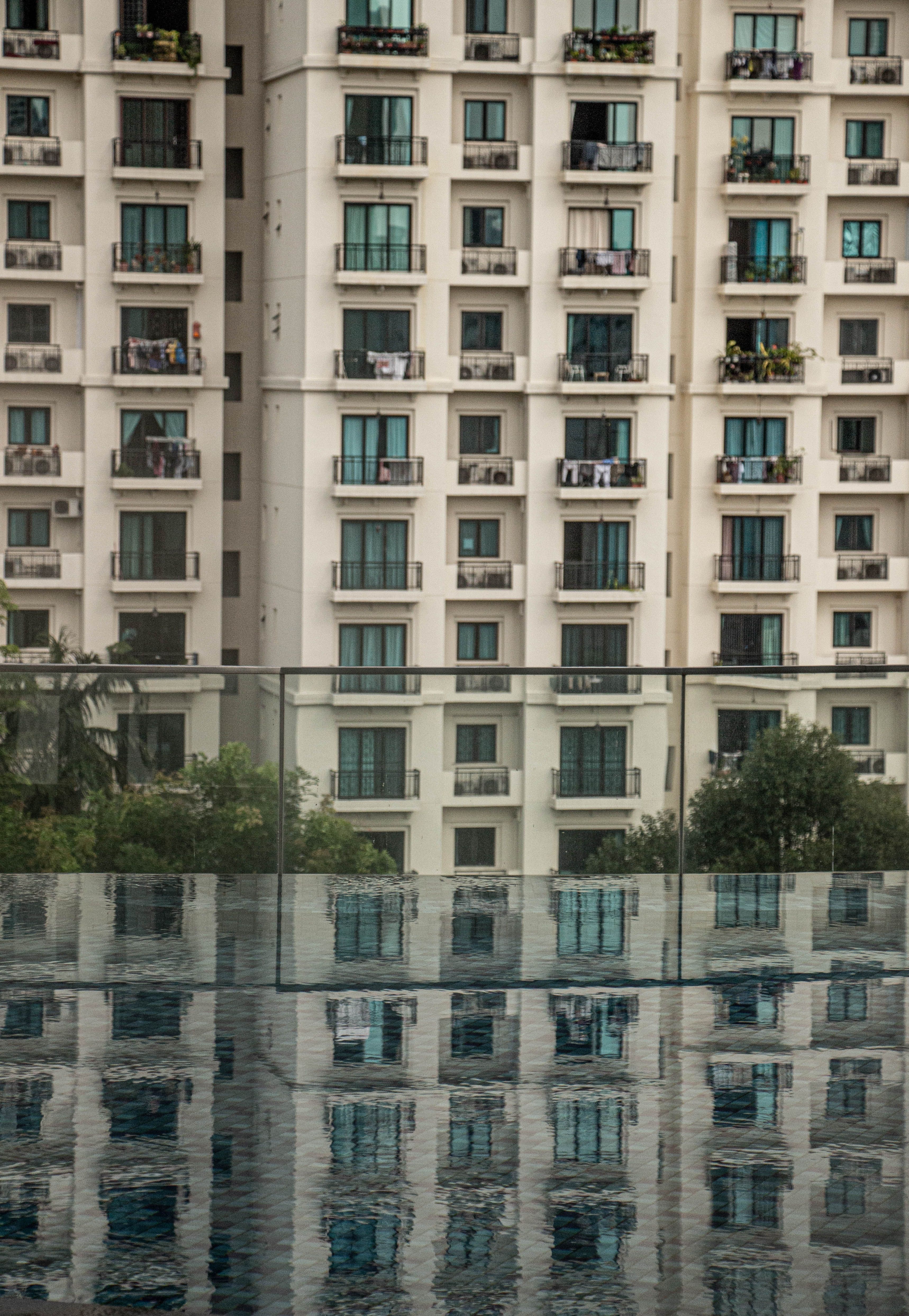 Curated visual reference: Gallery Detail: Modern Urban Living With Poolside View