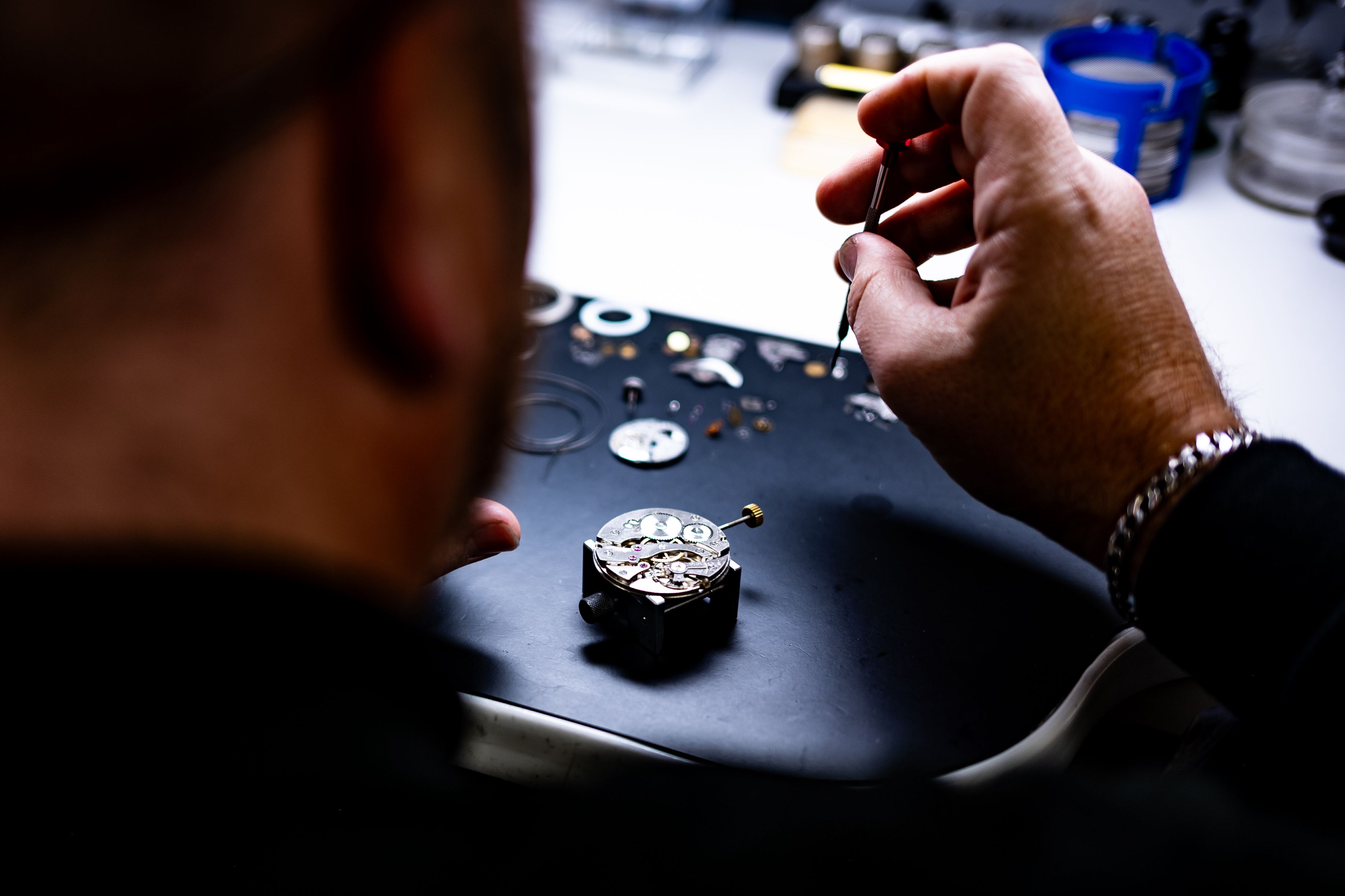 Close-Up of Watchmaker Crafting a Timepiece · Free Stock Photo