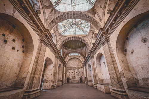 Free A captivating view of the architectural grandeur in the ruins of a cathedral in Antigua Guatemala. Stock Photo
