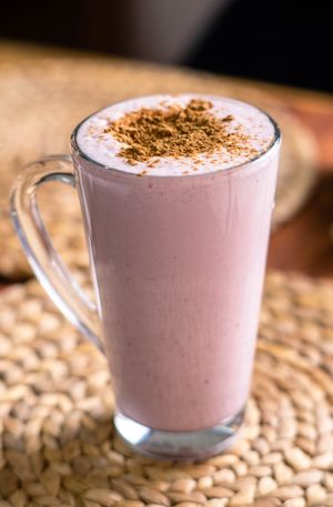 Pink strawberry shake in a clear glass mug — photo by Alejandro Aznar on Pexels