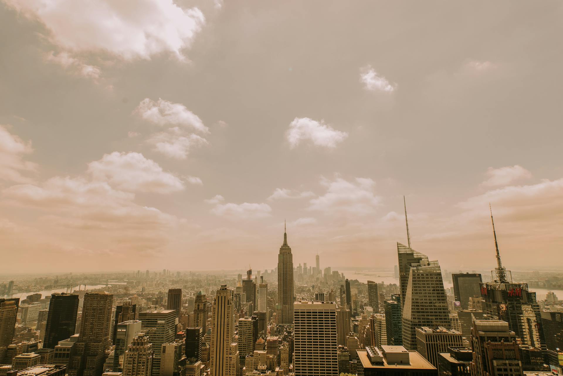 Stunning aerial view of New York City skyline featuring the iconic Empire State Building.