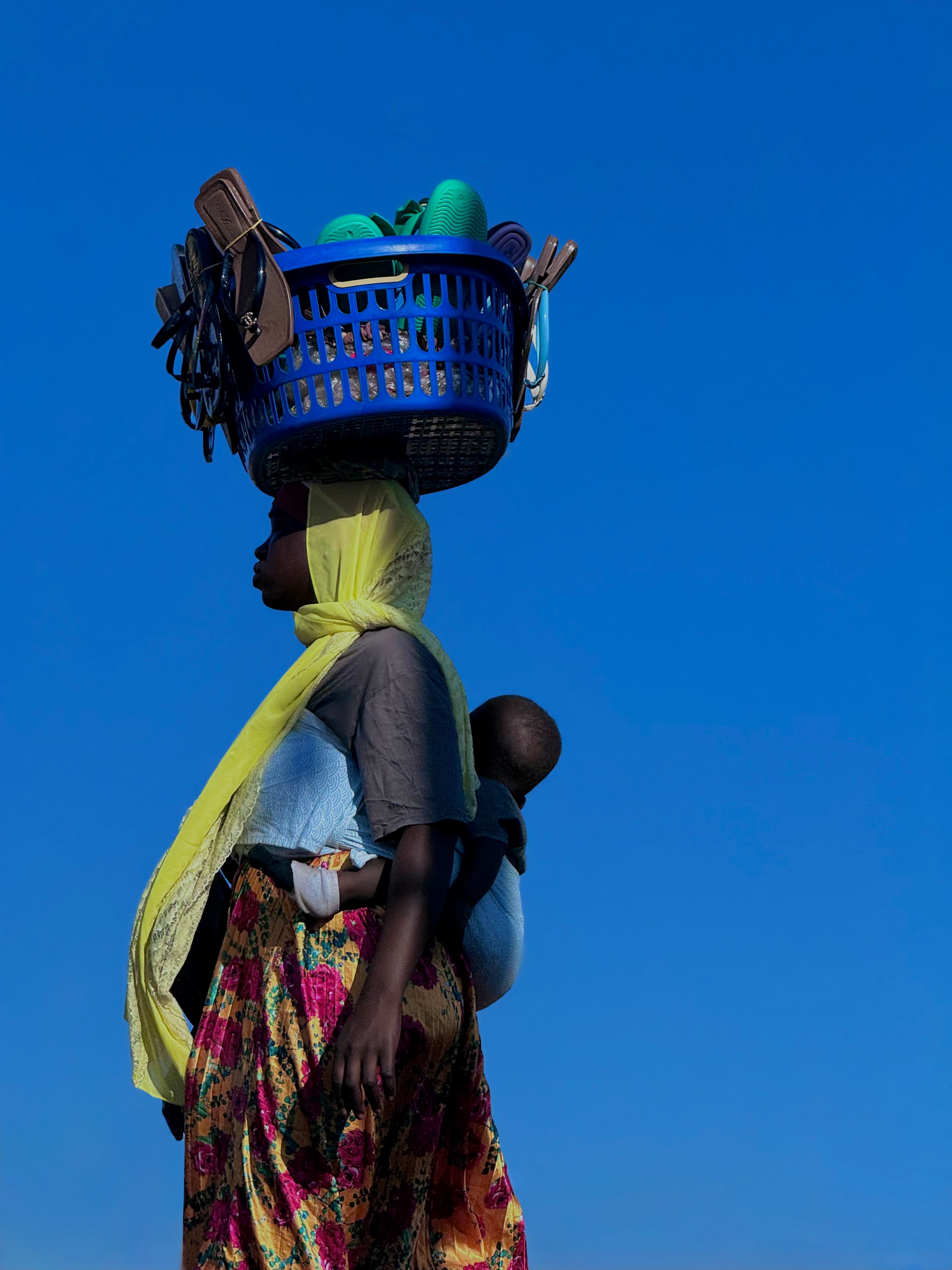 Woman Carrying Basket in Accra, Ghana · Free Stock Photo