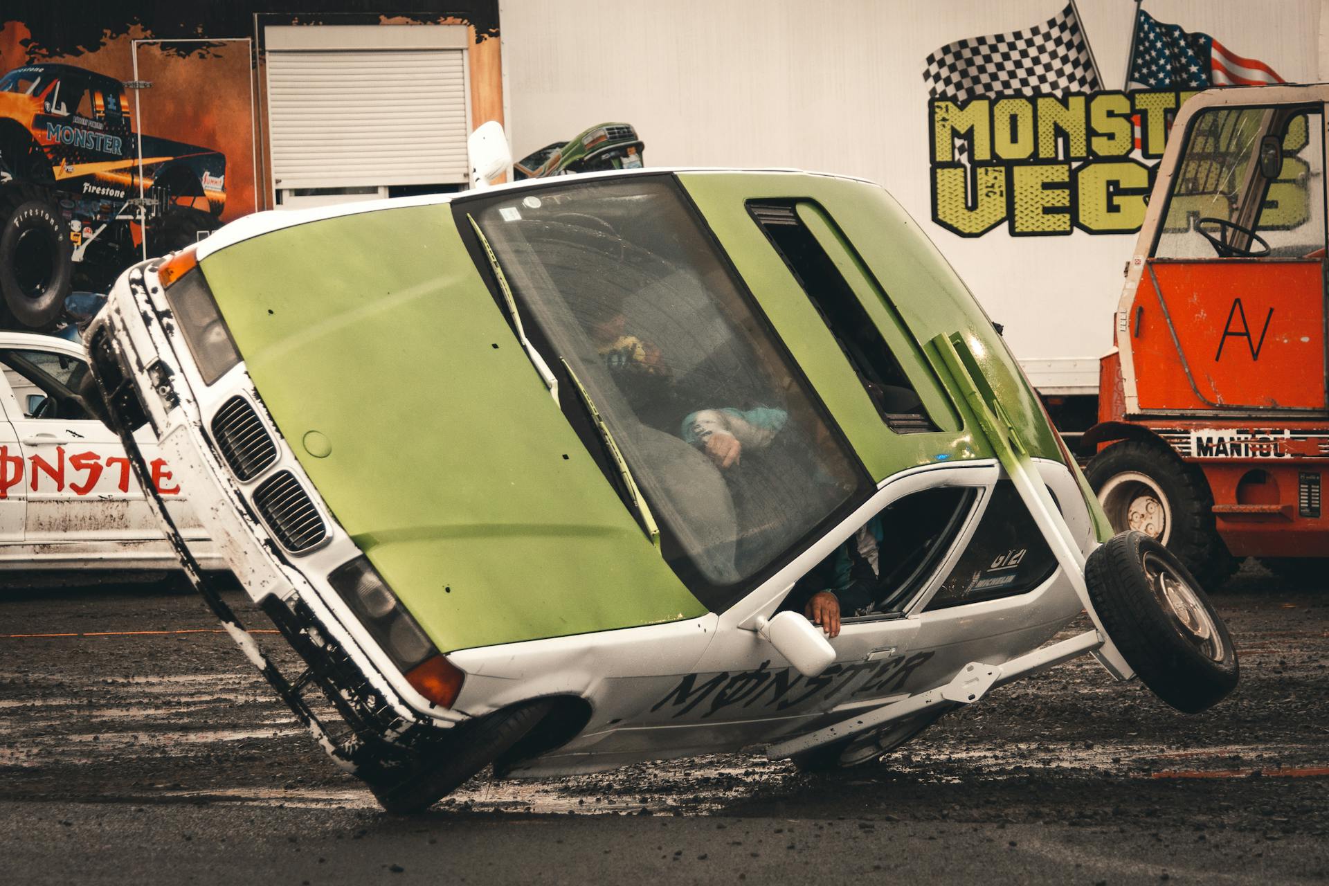 High-energy car stunt captured at Monster Vegas event, showcasing thrilling action and skill.