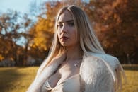 Elegant Woman in Autumn Park, Munich