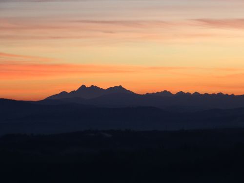 Free Majestic view of sunset over Tatra Mountains in Poland showing vibrant colors. Stock Photo