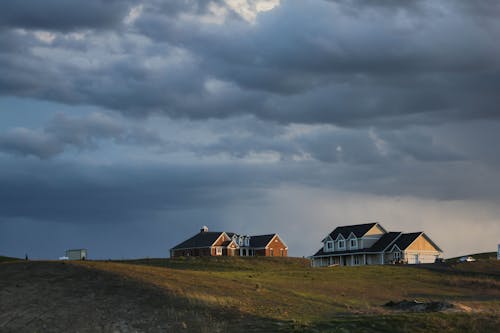 Houses Under Cloudy Sky