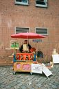 Man Standing Beside Stall