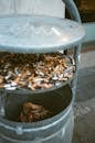 Cigarette Butts in Trash Bin