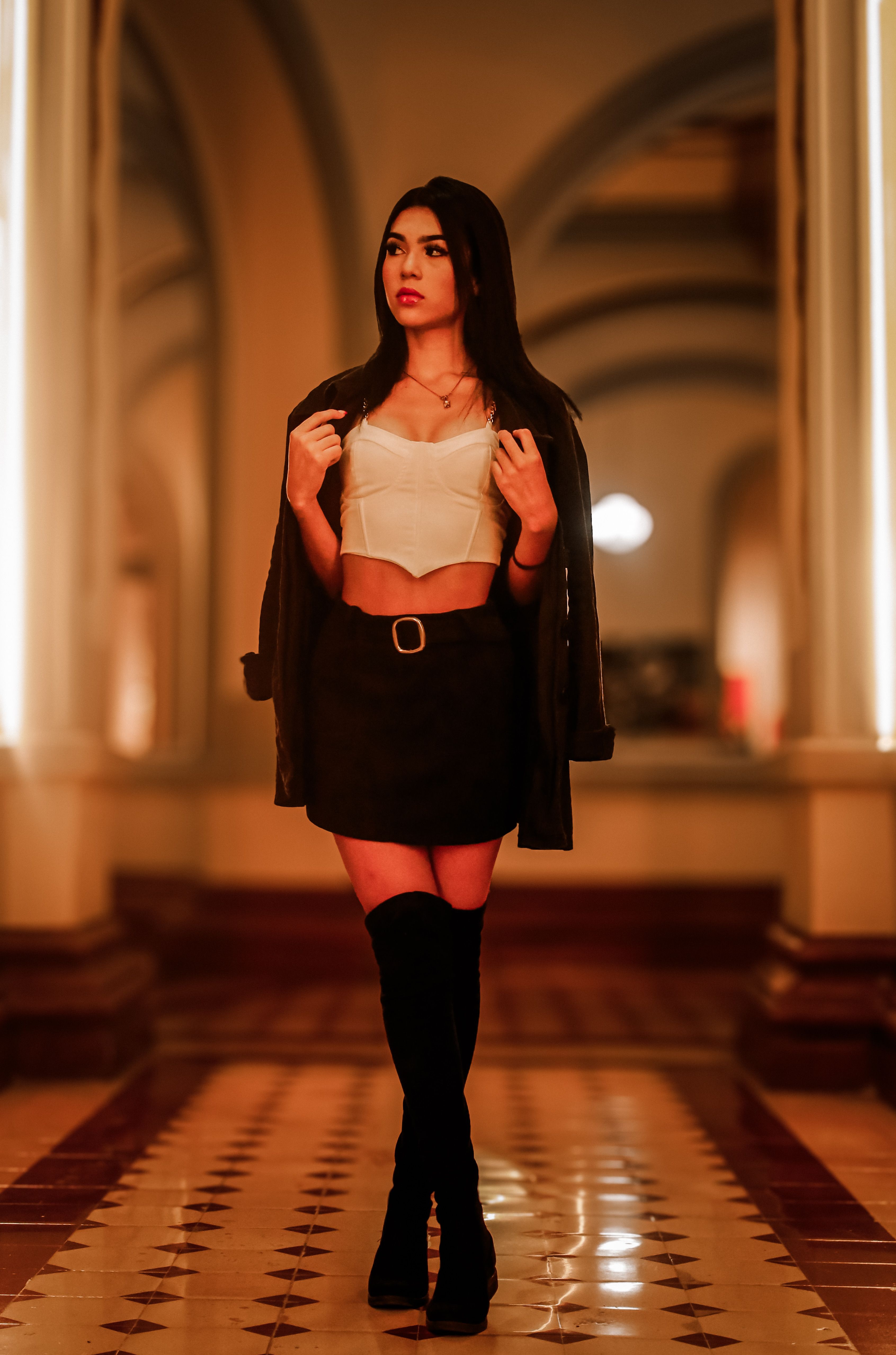 Stylish Woman Posing in Elegant Indoor Setting · Free Stock Photo