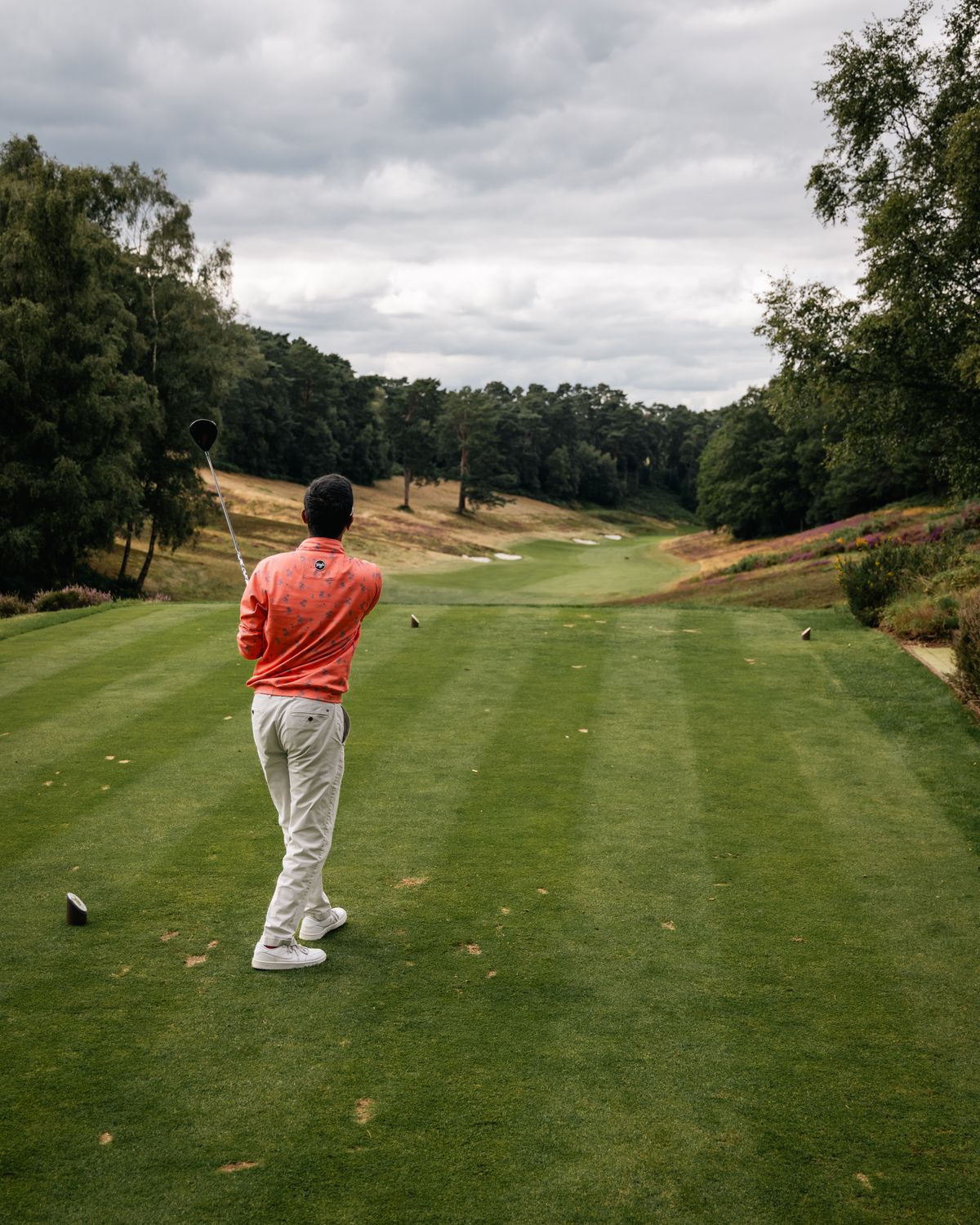 Golfer in action on a scenic golf course