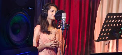 Free a girl recording song Stock Photo