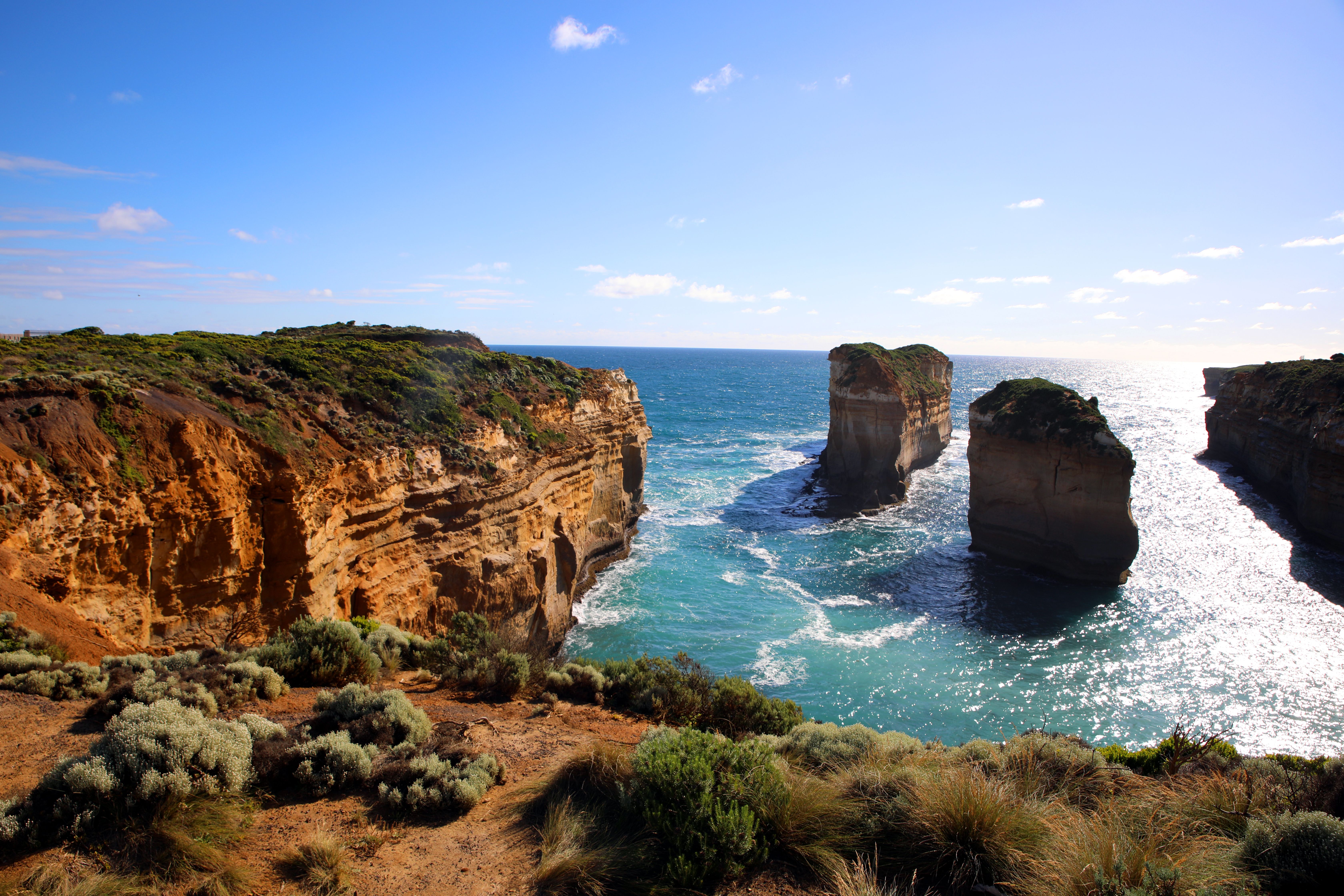 Australian coastal road, bright sun, blue sky
