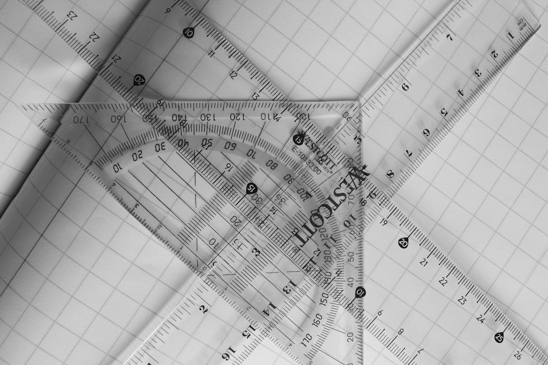 Geometric Tools on Graph Paper Grid · Free Stock Photo