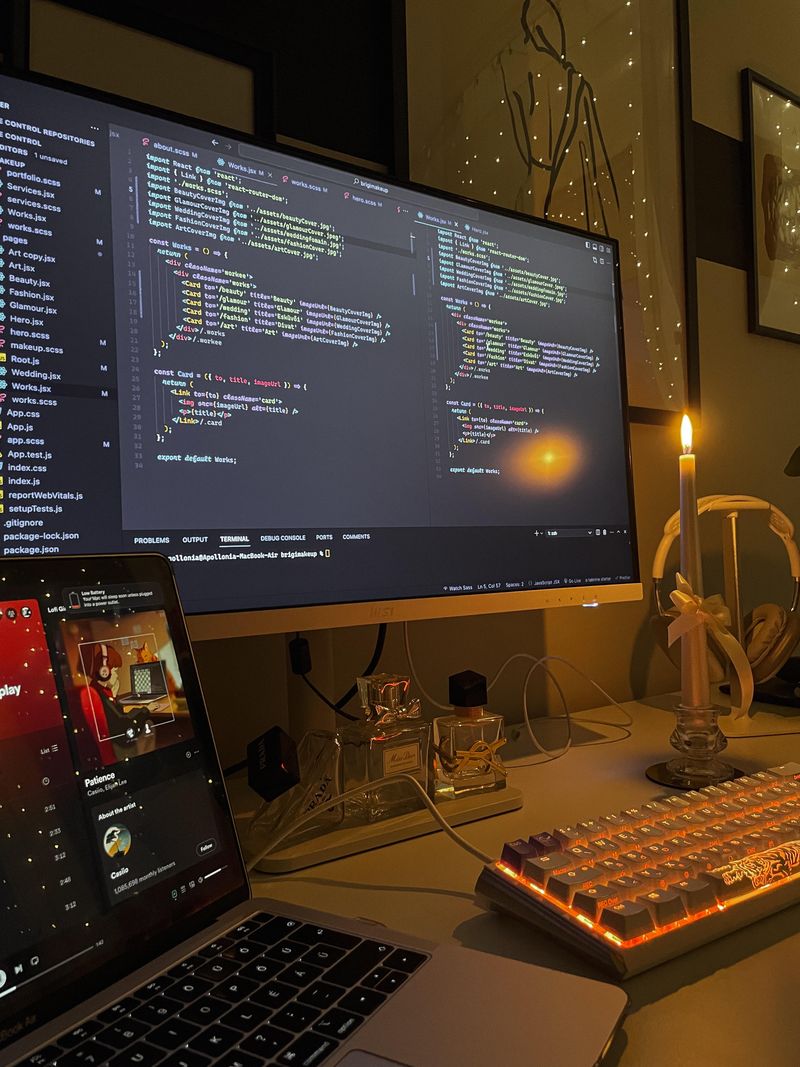 A developer's desk with ambient lighting late at night