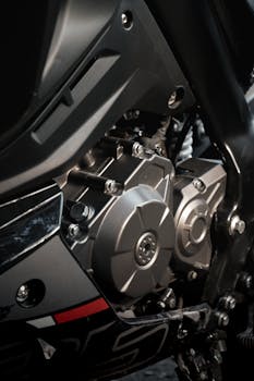 Detailed view of a motorcycle engine showcasing mechanical precision and design.