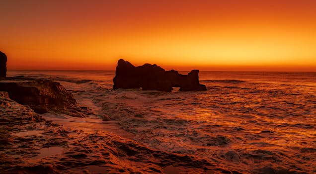 A stunning sunrise over the rocky coastline of Mar del Plata, Argentina.
