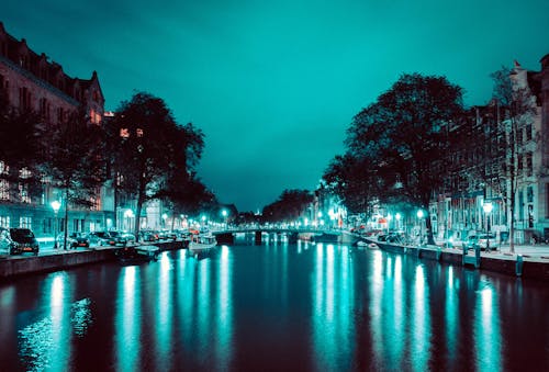 Body of Water Surround by Buildings