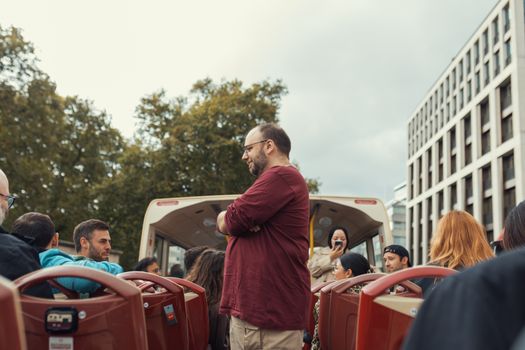 group laughing on wine tour bus