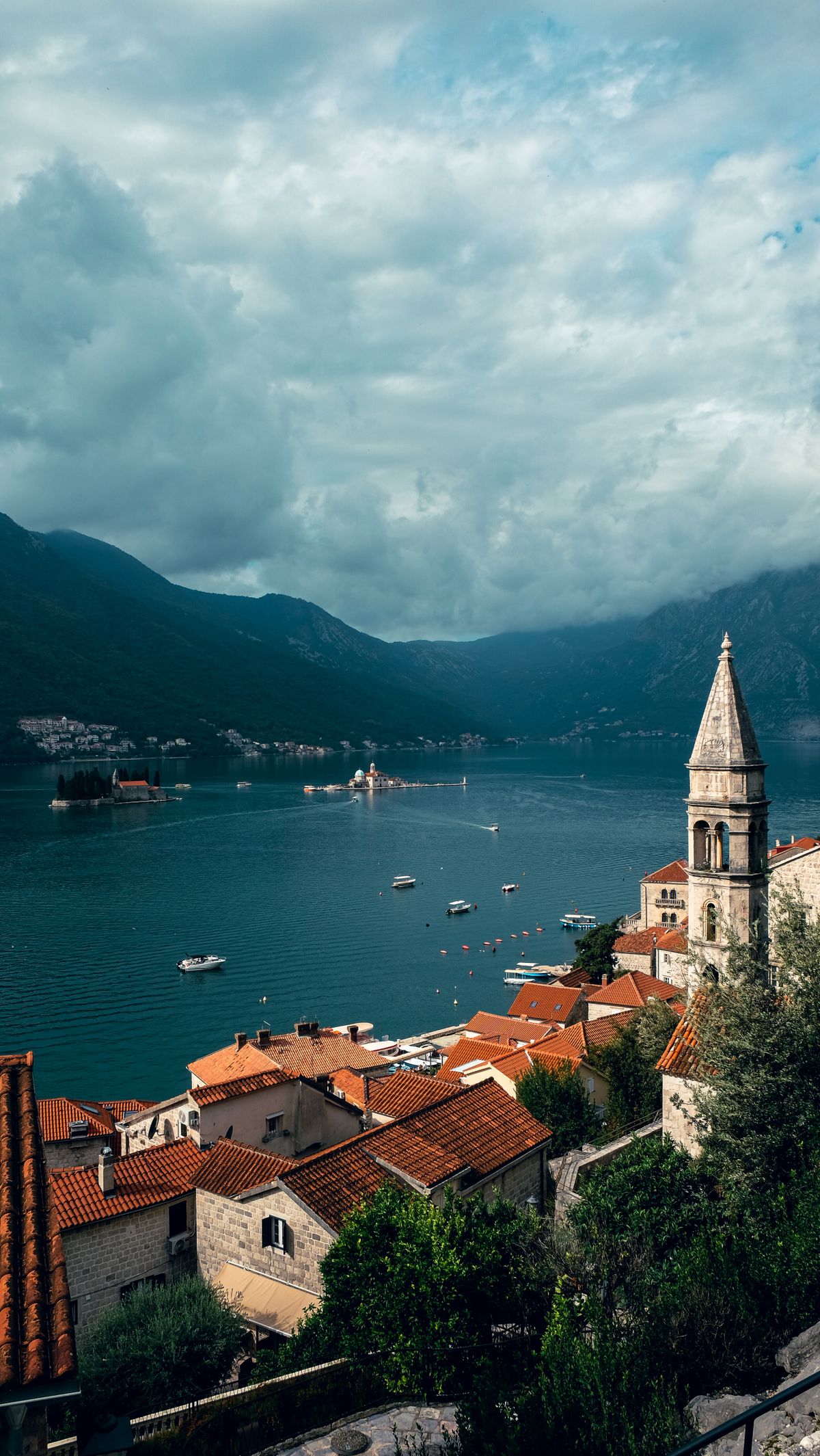 Scenic view of Kotor Bay from Perast, Montenegro — mountains falling to the still water of Boka Bay