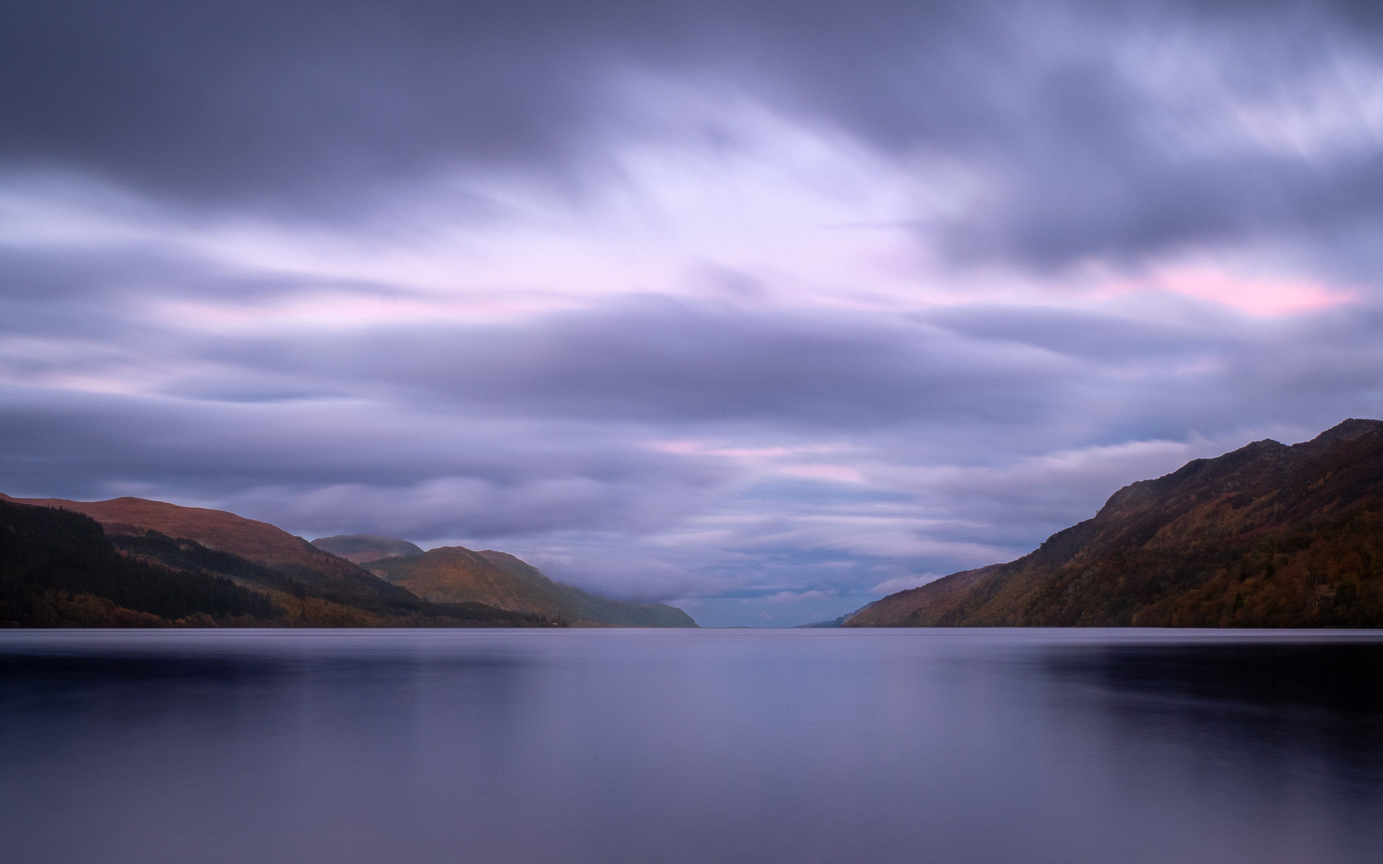 Scottish Highlands landscape with mountains and lochs