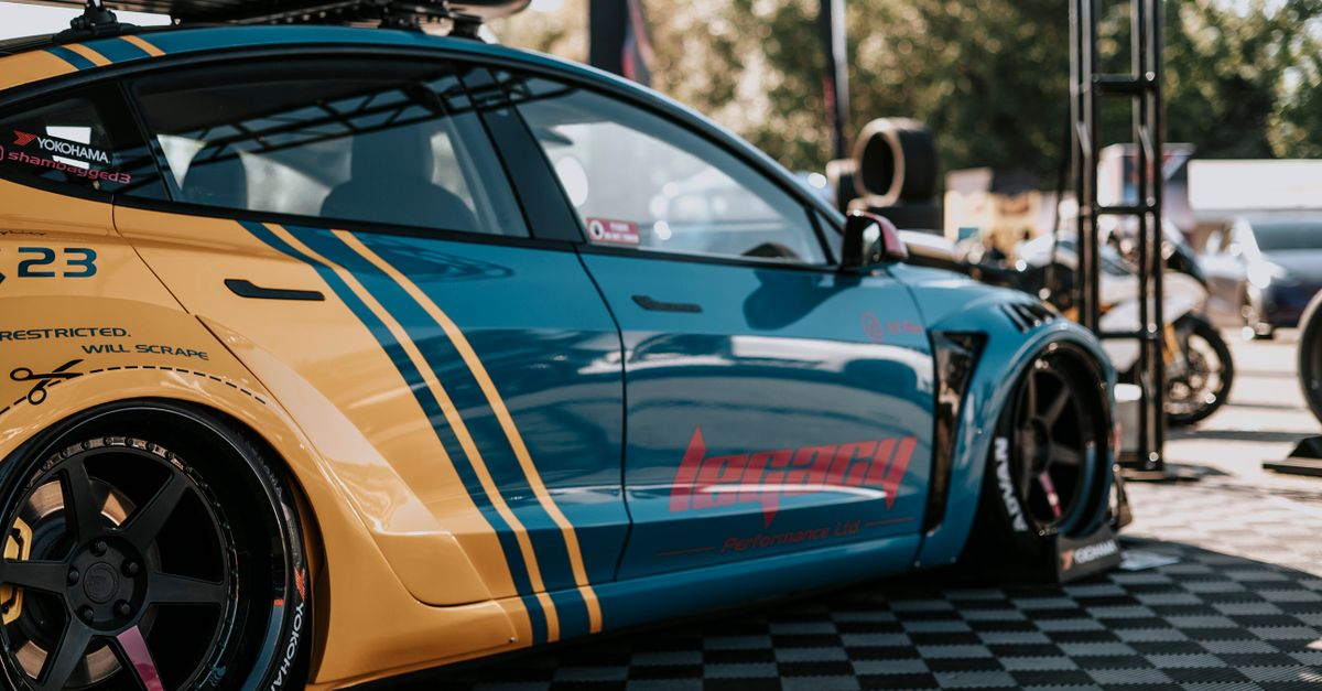 Custom Car Racing Custom Racing Car at Outdoor Auto Show · Free Stock Photo