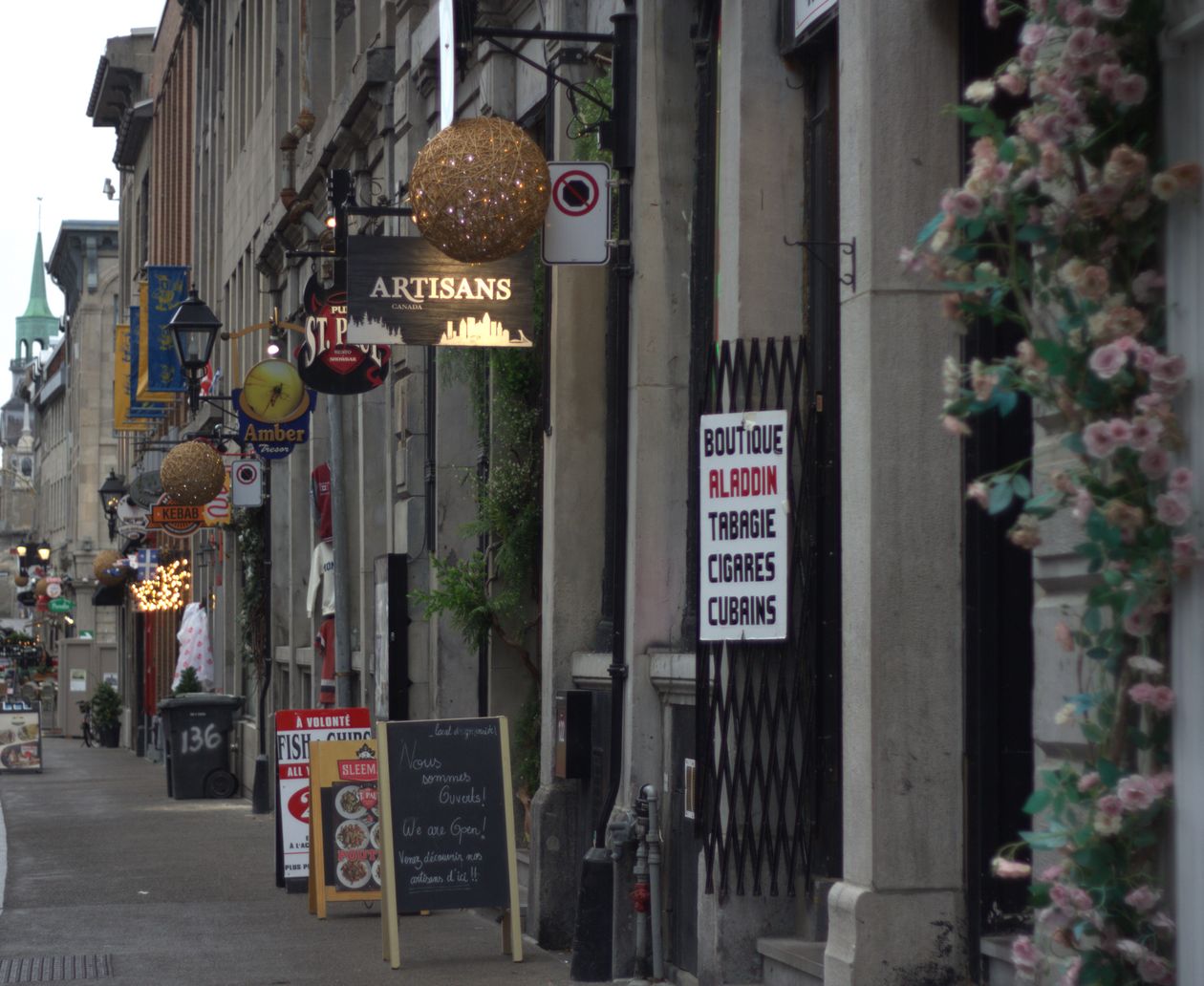 Charming Old Montreal street with shops and historic architecture