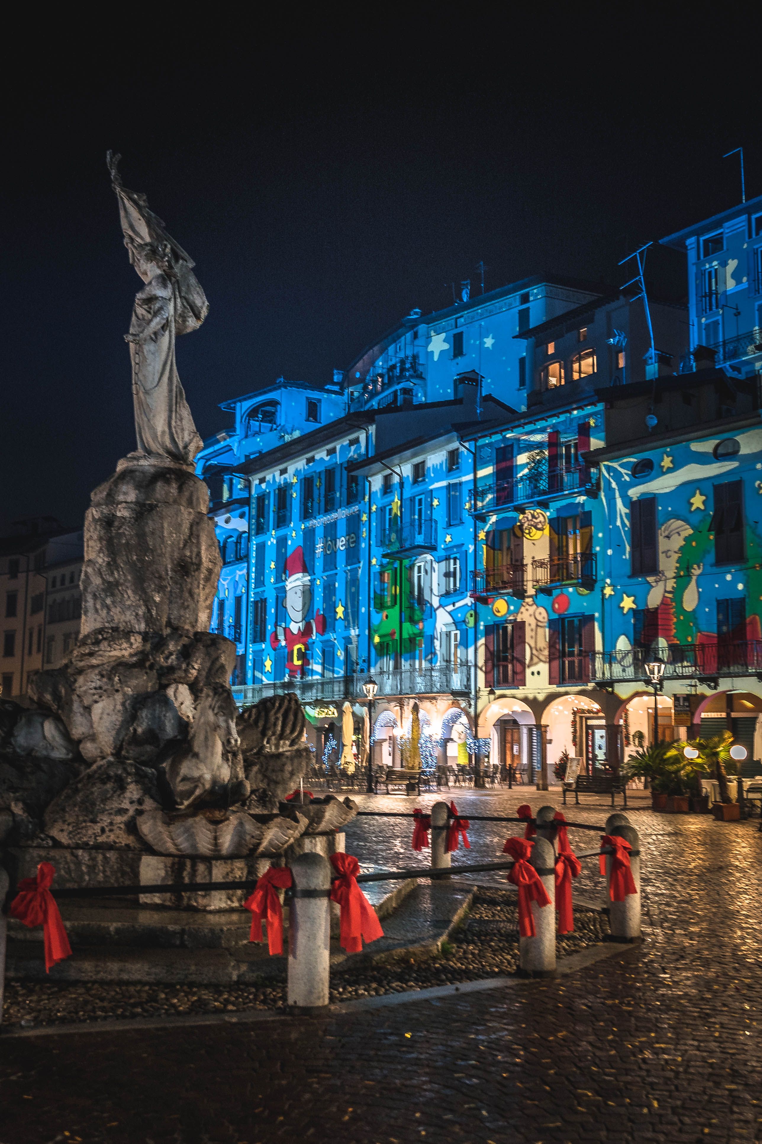 Beautiful town square decorated for the holidays with stunning light projections.